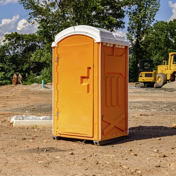 how often are the porta potties cleaned and serviced during a rental period in Petros